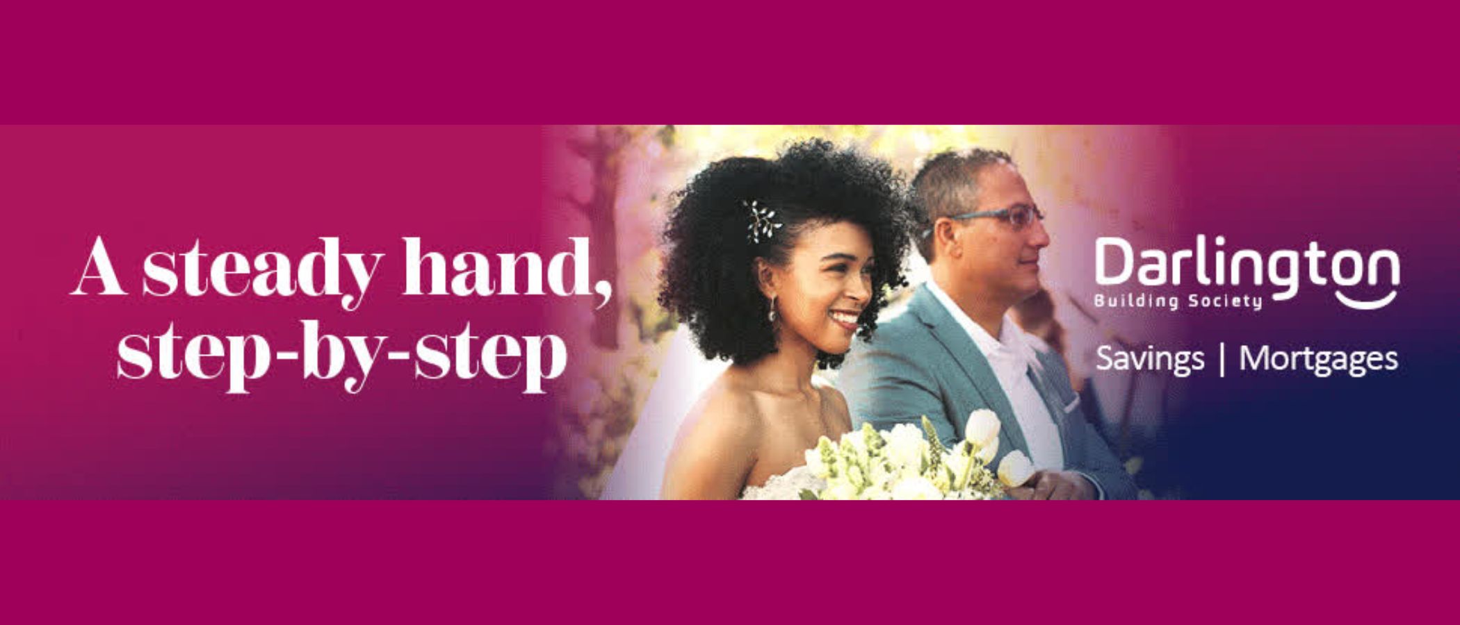Darlington Building Society banner reading A steady hand, step-by-step, beside a smiling bride walking with an older man at an outdoor wedding, with the Society's logo and the line Savings | Mortgages on a magenta and navy background.