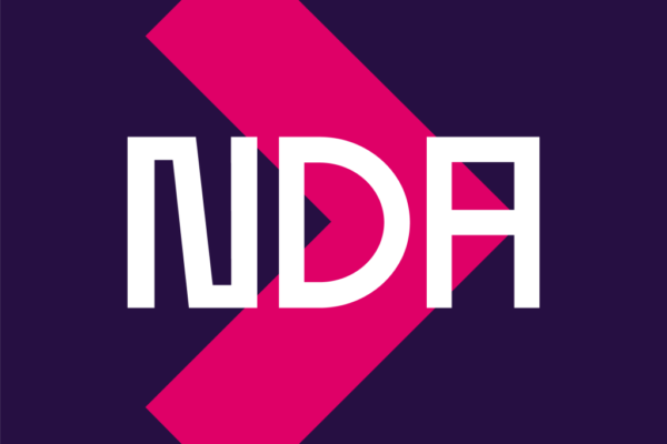 Image of a purple background featuring white text that spells out 'NDA'