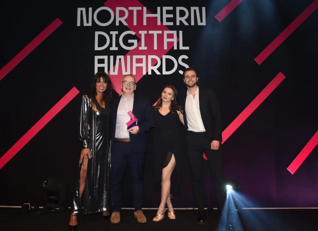The Route team collecting an award on stage at the Northern Digital Awards 2025